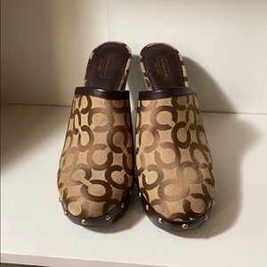 Brown Coach Clogs.